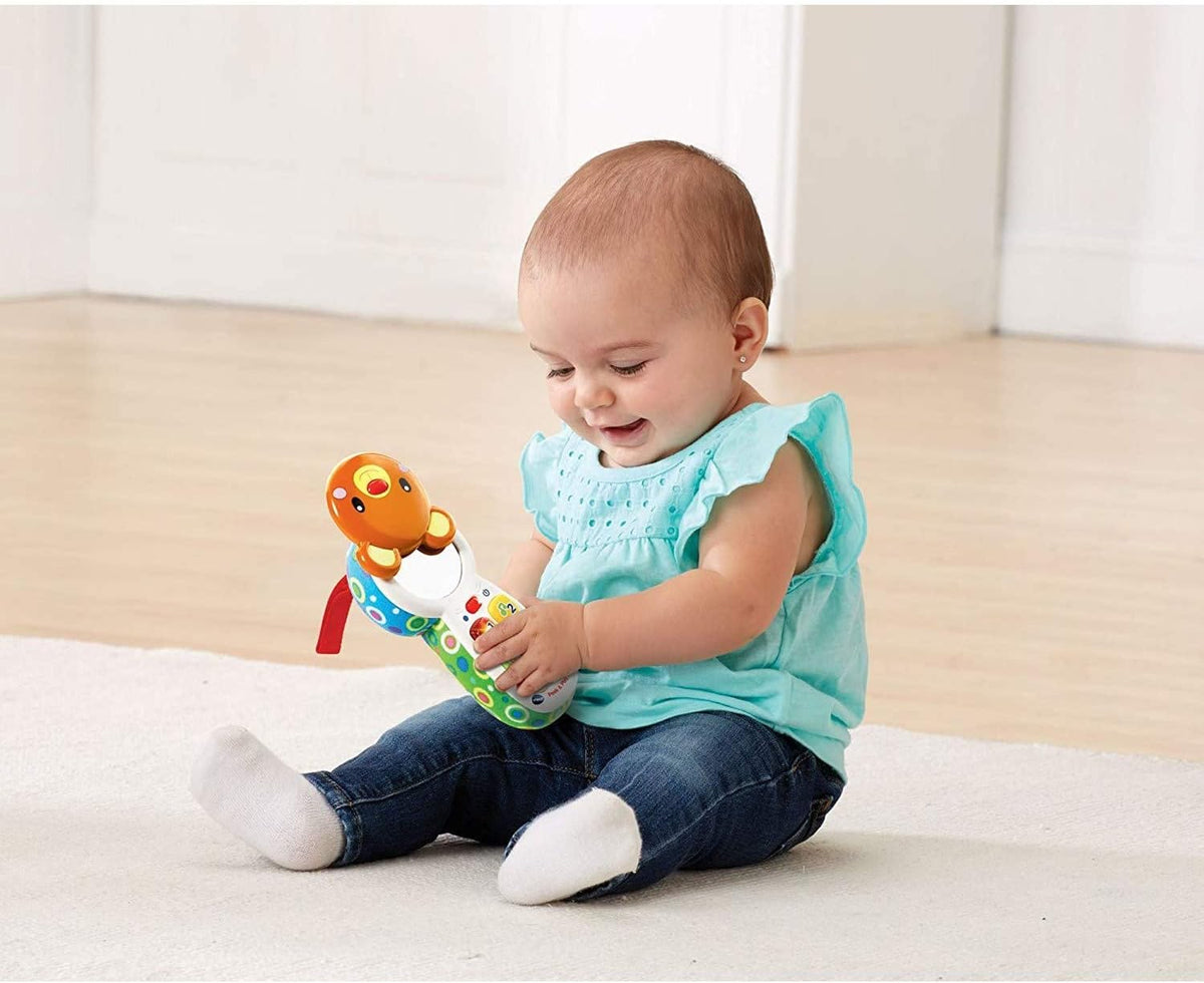 Vtech - Peek-A-Boo Musical Phone - Multicolour | Colourful phone features 4 press buttons introducing feelings, numbers, colours, and first words.| suitable ages 3+ up
